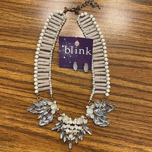 NWT fabulous costume necklace and earrings set. Cream and clear stones.